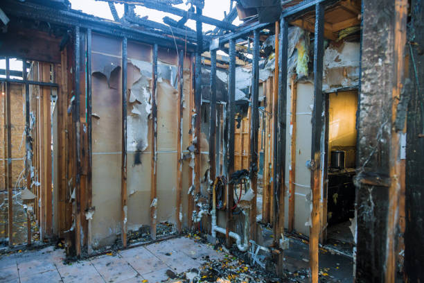 Professional Fire Damage Restoration technician working in Amityville, NY